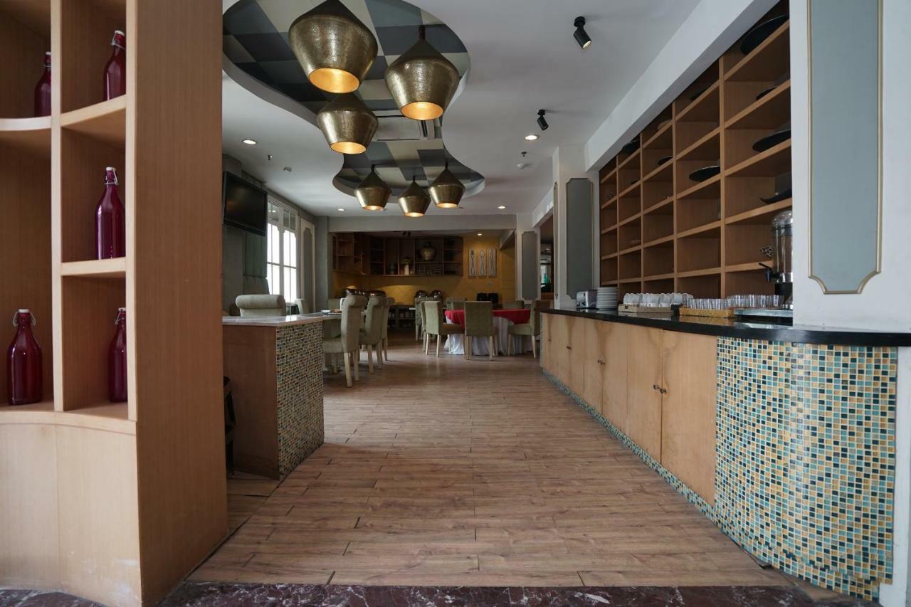 Capital O 1128 Hotel Imara Palembang Zewnętrze zdjęcie