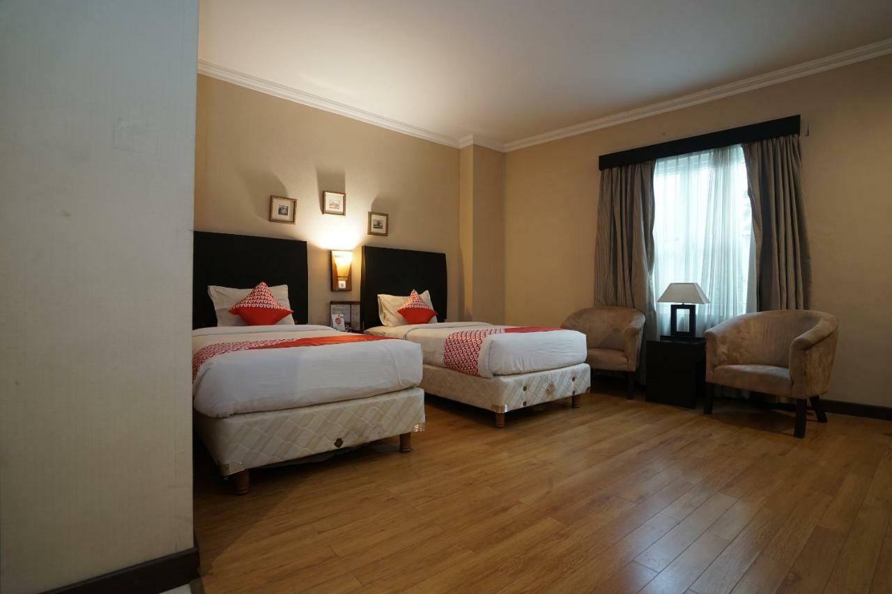 Capital O 1128 Hotel Imara Palembang Zewnętrze zdjęcie